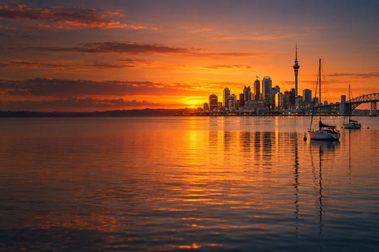 Auckland harbour and skyline at sunset
